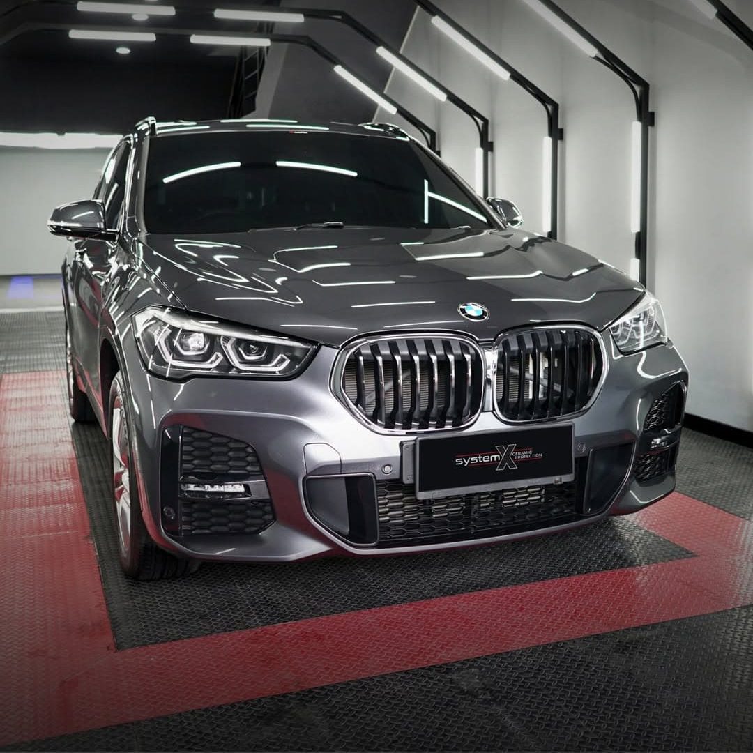 BMW X1 diproteksi dengan Ceramic Coating Pro Ultimate dari System X. Premium wash _Paint correct